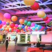 Multicoloured hanging array of lanterns